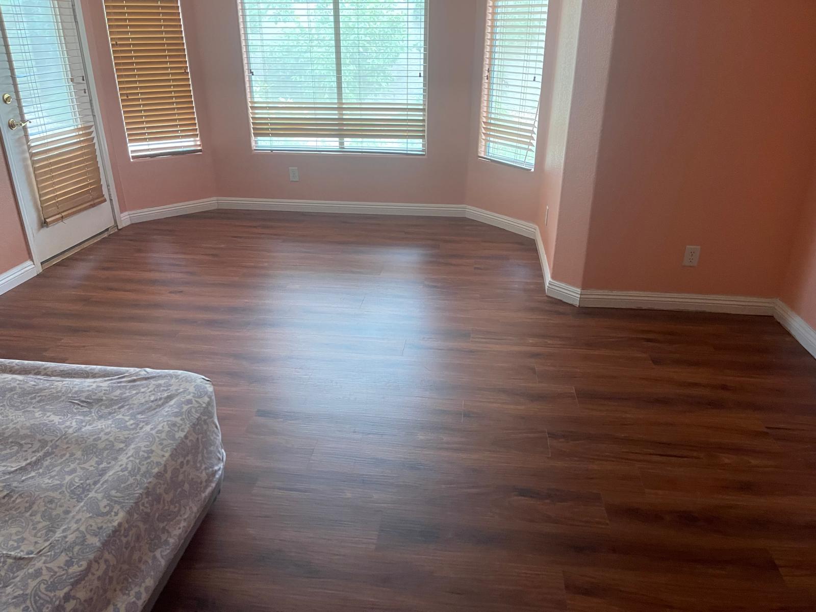 Hardwood-style bedroom flooring