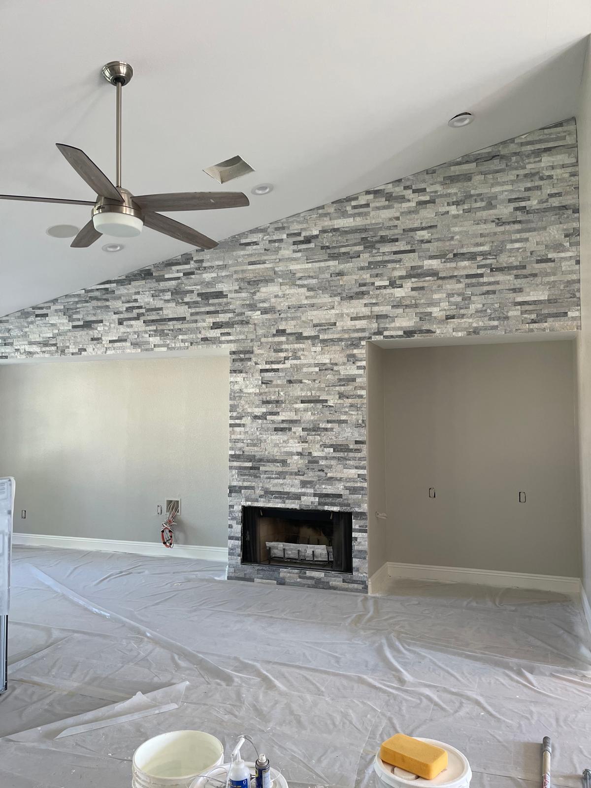 Stacked stone fireplace accent wall
